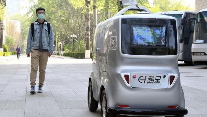 Covid-19: автономный автомобиль для измерения температуры прохожих в Китае | New-Science.ru
